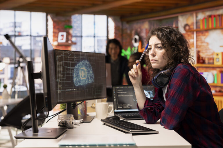 woman working ai tech agency providing custom software development services - Recruiterfy.ai